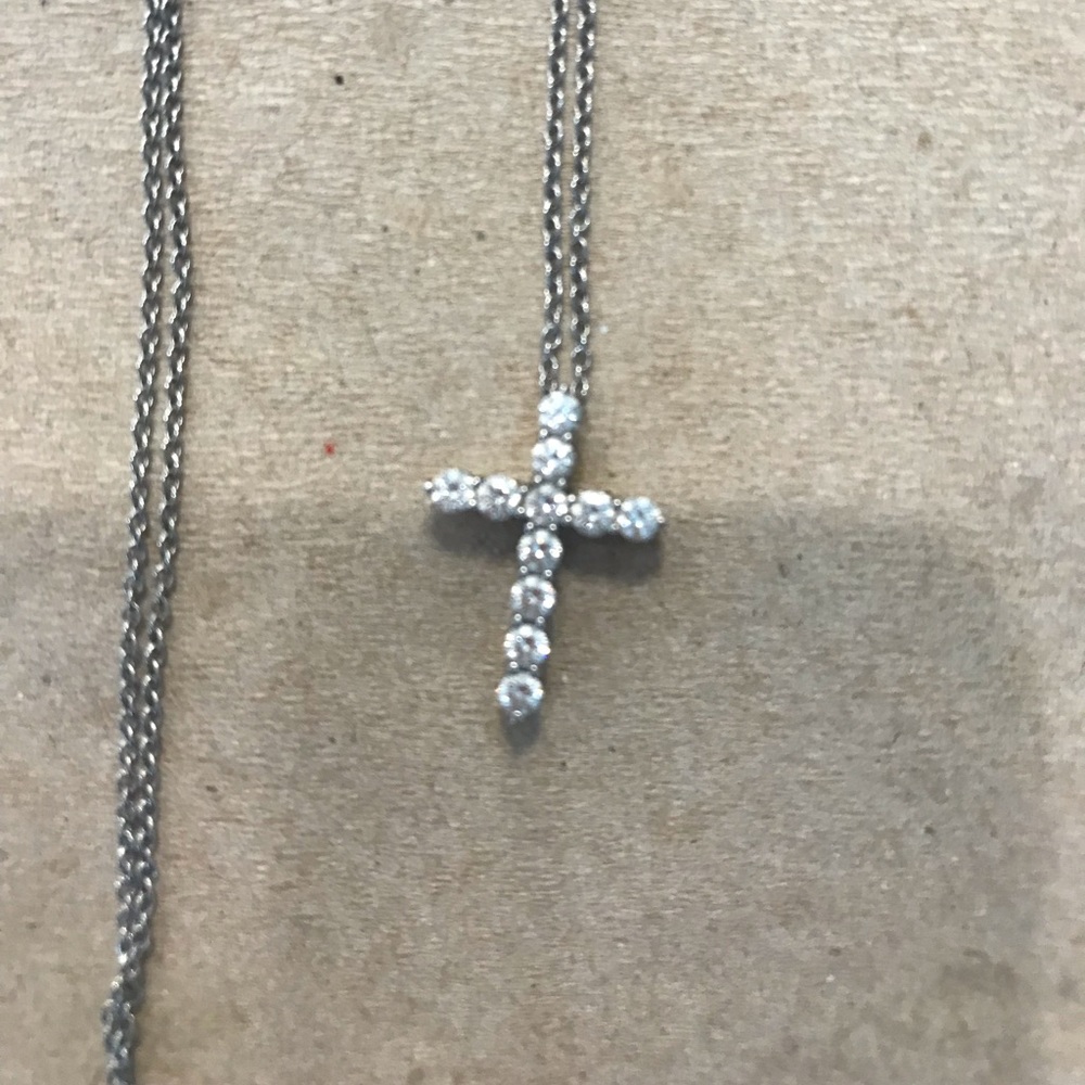Tiffany’s diamond platinum cross pendant necklace